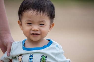 little boy have a good time at the beach