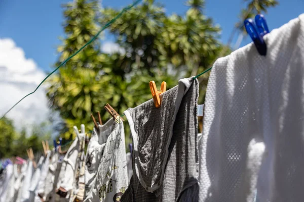 stock image Baby laundry hanging on a clothesline