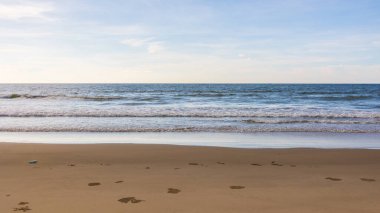 beautiful and clean beach with beach wave during evening