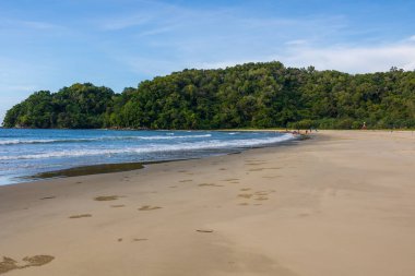 beautiful and clean beach with beach wave during evening