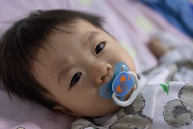 Close-up portrait image of 1 to 2 years old hand during baby sleeping