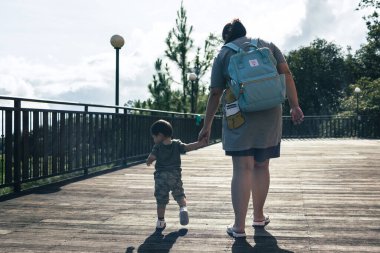 little boy and his mother have a good time at the during holiday