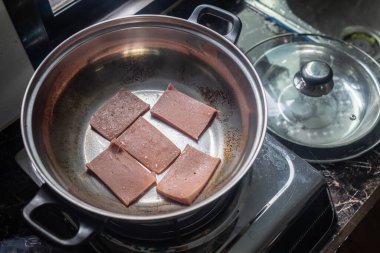 Lady Hand fried luncheon meat as a breakfast