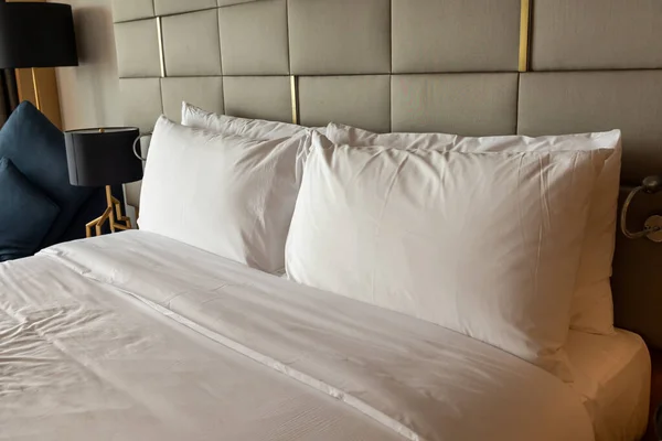 Comfort and clean white bed sheet on hotel room