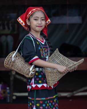 Penampang,Sabah-May 31,2023 : Portrait image of a woman from Kadazandusun ethnic wearing traditional costumes during Kaamatan Festival at KDCA Penampang,Sabah, Malaysia clipart