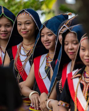 Penampang,Sabah-May 31,2023 : Portrait image of a woman from Kadazandusun ethnic wearing traditional costumes during Kaamatan Festival at KDCA Penampang,Sabah, Malaysia clipart