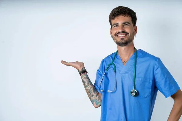 Handsome Nurse Man Wearing Surgeon Uniform White Background Smiling Cheerful — Stock Photo, Image