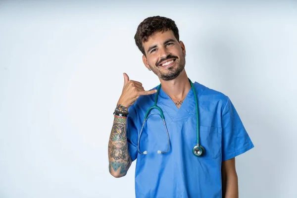 Handsome Nurse Man Wearing Surgeon Uniform White Background Smiling Doing — Stock Photo, Image