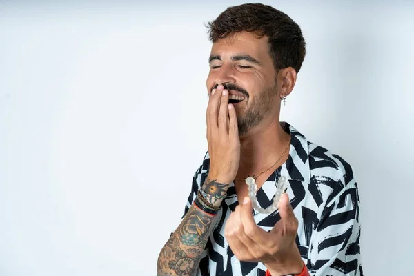 Happy Young Caucasian Man Wearing Printed Shirt Holding Showing Camera — Stock Photo, Image