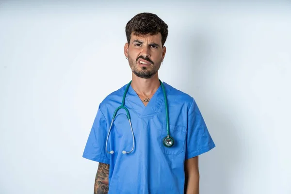 Portrait Dissatisfied Handsome Nurse Man Wearing Surgeon Uniform White Background — Stock Photo, Image
