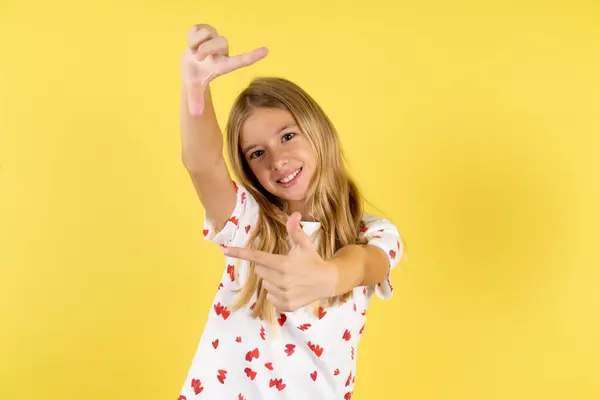 Caucasian Kid Girl Wearing Polka Dot Shirt Yellow Background Making — Stock Photo, Image