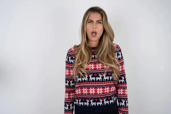 Portrait Dissatisfied Beautiful Blonde Woman Wearing Knitted Christmas Sweater Smirks — Stock Photo, Image
