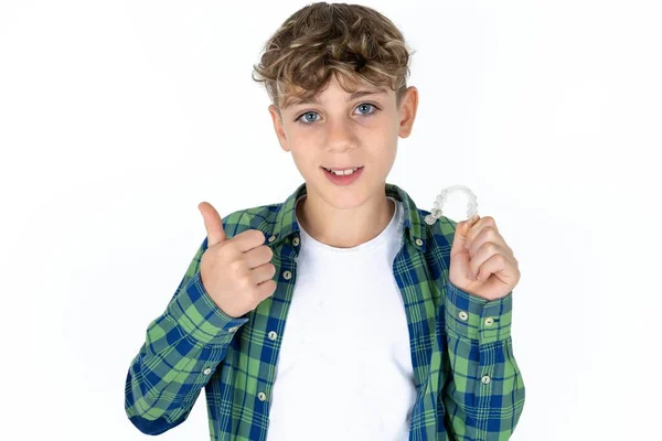 Handsome Teen Boy Wearing Plaid Shirt White Background Holding Invisible — Stock Photo, Image