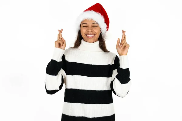 Young Beautiful Woman Wearing Striped Sweater Santa Claus Hat Has — Stock Photo, Image