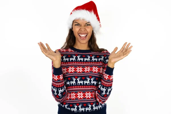 Crazy Outraged Beautiful Hispanic Woman Wearing Knitted Sweater Santa Claus — Stock Photo, Image