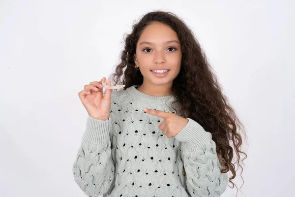 Beautiful Kid Girl Wearing Sweater Holding Invisible Aligner Pointing Dental — Stock Photo, Image