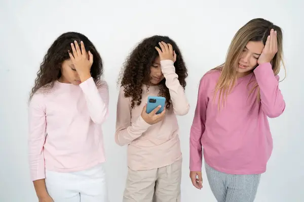 Upset Depressed Three Young Beautiful Multiracial Kid Girls Makes Face Royalty Free Stock Images