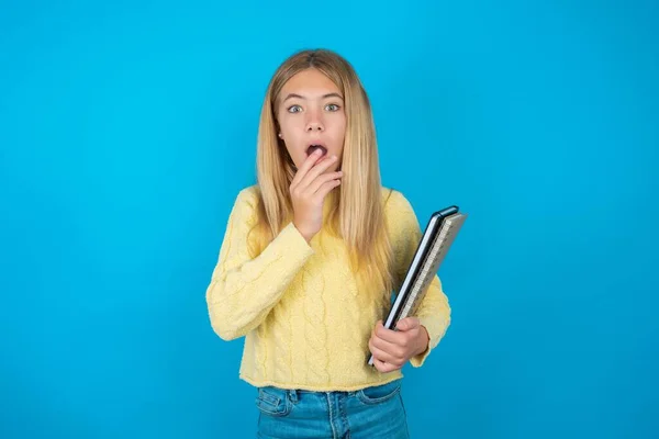 Nervous Puzzled Beautiful Kid Girl Wearing Yellow Sweater Opens Mouth — Stock Photo, Image