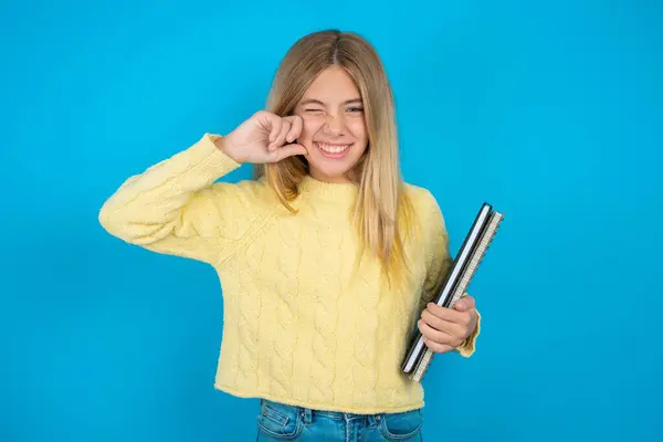 Happy Beautiful Kid Girl Wearing Yellow Sweater Ignores Loud Music — Stock Photo, Image