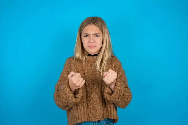Displeased Annoyed Beautiful Kid Girl Wearing Brown Knitted Sweater Clenches — Stock Photo, Image