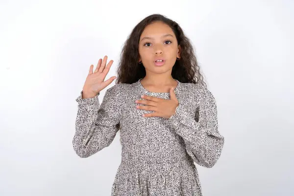 Beautiful Teen Girl Wearing Grey Dress White Background Swearing Hand — Stock Photo, Image