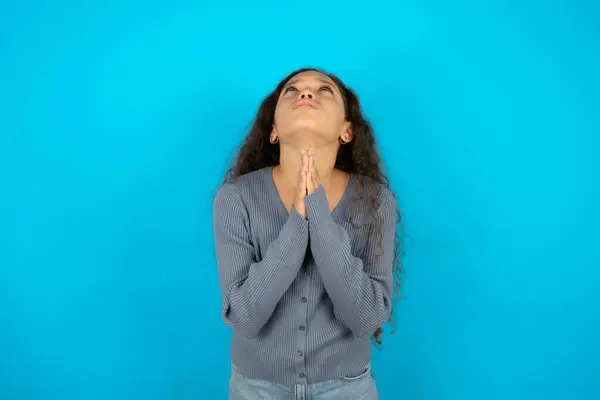 Beautiful Kid Girl Wearing Casual Jacket Blue Background Begging Praying — Stock Photo, Image