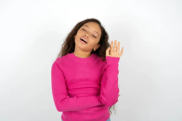 Overjoyed Successful Beautiful Kid Girl Wearing Pink Turtleneck White Background — Stock Photo, Image