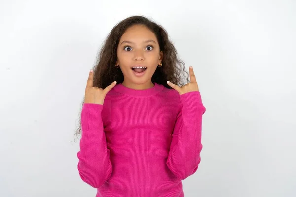 Beautiful Kid Girl Wearing Pink Turtleneck White Background Makes Rock — Stock Photo, Image