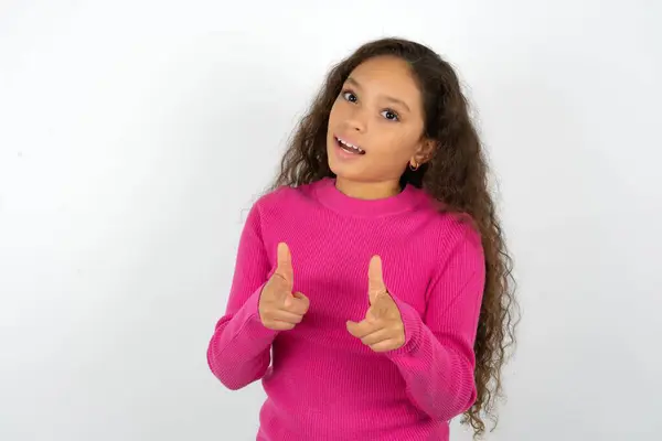 Beautiful Kid Girl Wearing Pink Turtleneck White Background Directs Fingers — Stock Photo, Image