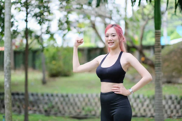 stock image Young woman athlete exercising outside