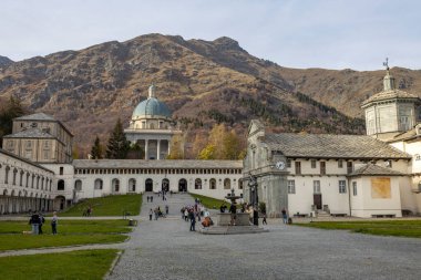 OROPA, ITALY, OCTOBER 30, 2022 - Lower Basilica and Oropa Sanctuary on the background, marian sanctuary dedicated to the Black Madonna, Biella province, Piedmont, Italy