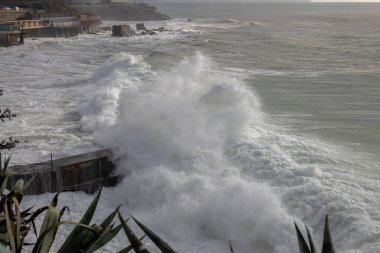 Rough sea  on the pier of Genoa Quinto, Italy