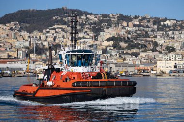 GENOA, ITALY, FEBRUARY 2, 2023 - Close up of a tugboat in the port of Genoa, Italy
