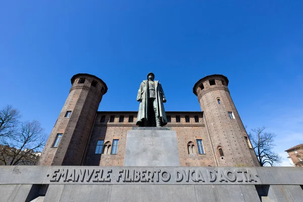 stock image TORINO (TURIN), ITALY, MARCH 25, 2023 - View of Acaja's Castle with the Emanuele Filiberto Duca d'Aosta's Monument in Castello Square, Torino, Italy