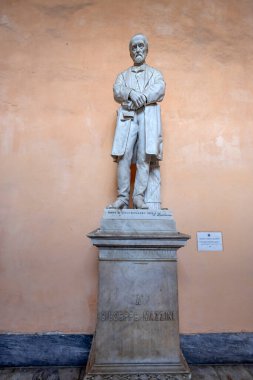GENOA, ITALY, JANUARY 29, 2024 -The Statue of Giuseppe Mazzini inside Tursi Palace in the historic centre of Genoa, Italy clipart