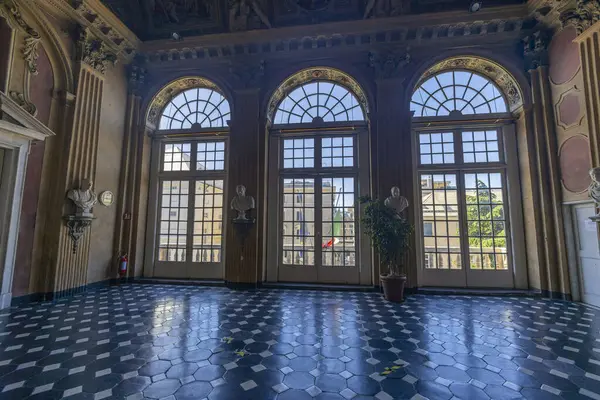 stock image GENOA, ITALY, MAY 18, 2024 -  The hall with big windows of Villa Scassi - Imperiale of Genoa, Italy