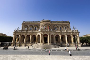 NOTO, ITALY, JUNE 22, 2023 - View of Ducezio Palace, the Noto Town Hall, in Noto, province of Syracuse, Sicily, Italy clipart