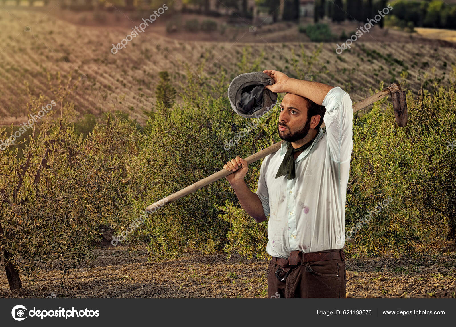 Tired Sweaty Farmer Hoe His Shoulder Stock Photo by ©AntonioGravante  621198676