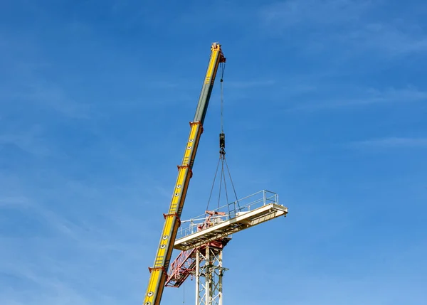 stock image Disassembly of a construction crane.