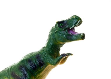 Beyaz arka planda izole edilmiş bir tyrannosaurus rex 'in canlı oyuncak kopyası..
