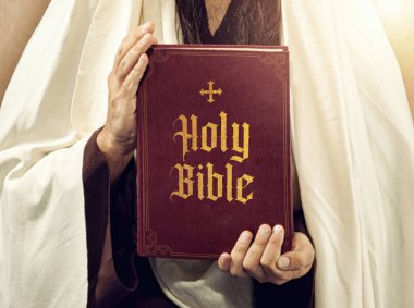 Geleneksel giysiler içindeki peygamberin kutsal bir İncil 'i vardır. İnanç ve maneviyat yayar. İncil, din, inanç, dua, bilgelik