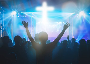 Hand praying and raised hand worship with faith,