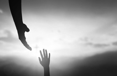 giving a hope helping hand  and support over black and white background background.