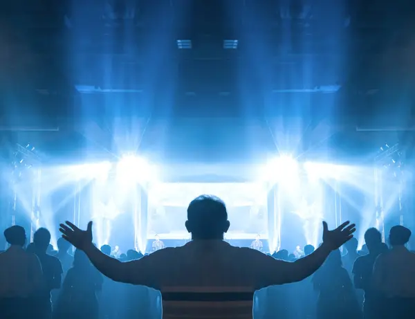 Christian worship God together in Church ,raised hand and praise the lord