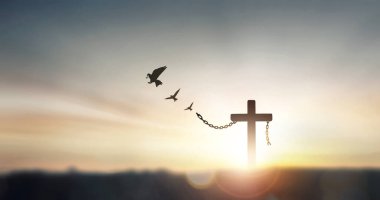 İsa 'nın haçı, pazar gününün arka planında bariyeri kır.