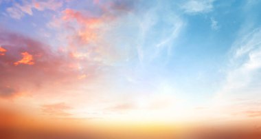 amazing panoramic sunrise or sunset sky with gentle colorful clouds. clipart