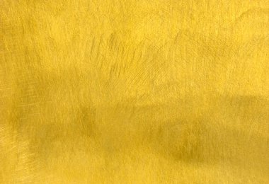 Parlak sarı yaprak altın folyo dokusu arka plan