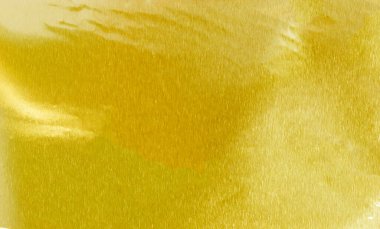 Parlak sarı yaprak altın folyo dokusu arka plan