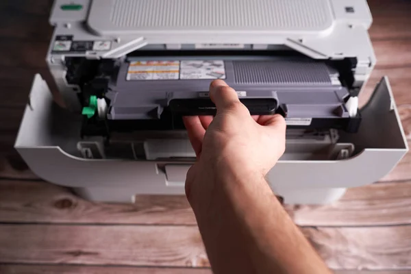 changing the toner in a printer. High quality photo