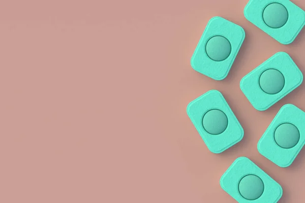 Strewn dishwasher detergent tablets on baige background. Top view. Copy space. 3d render